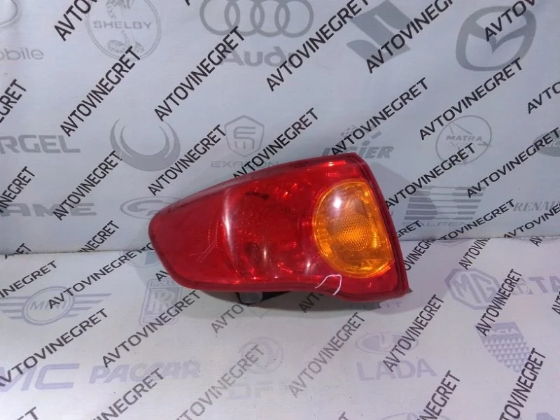 Фонарь левый Toyota Corolla 150