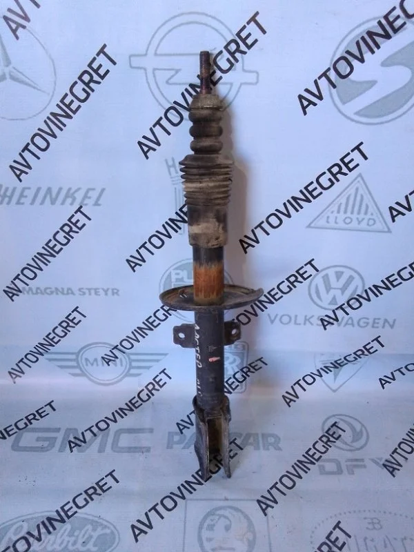 Стойка амортизатор передняя Renault Duster