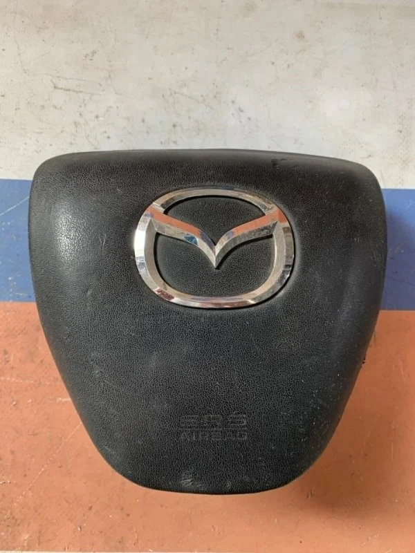 Заглушка безопасности в руль Mazda Mazda 6 GDK557K00 GH