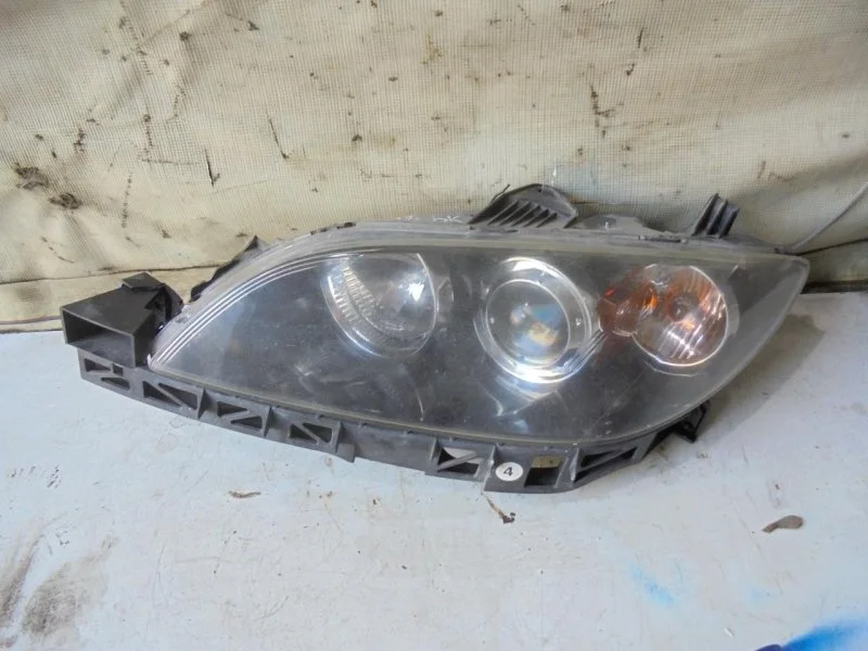 Кронштейн фары Mazda Mazda 3 2002-2009 BN8V50161 BK