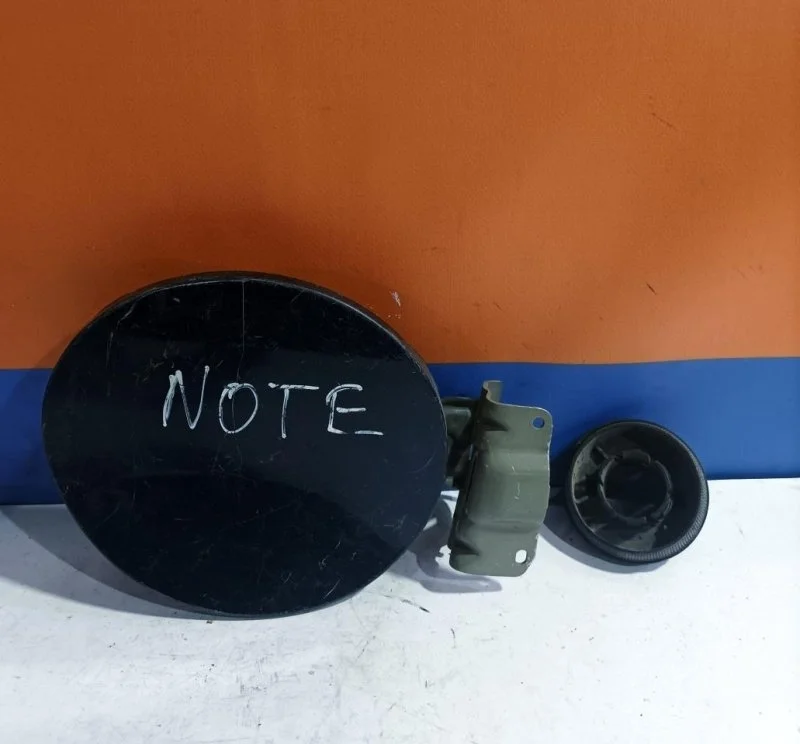 Лючок бензобака Nissan Note 788309U00A