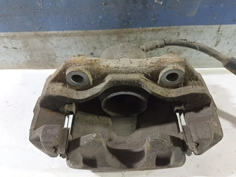 Суппорт тормозной Volkswagen Polo Sedan 2011-2020 1K0615124E, передний правый