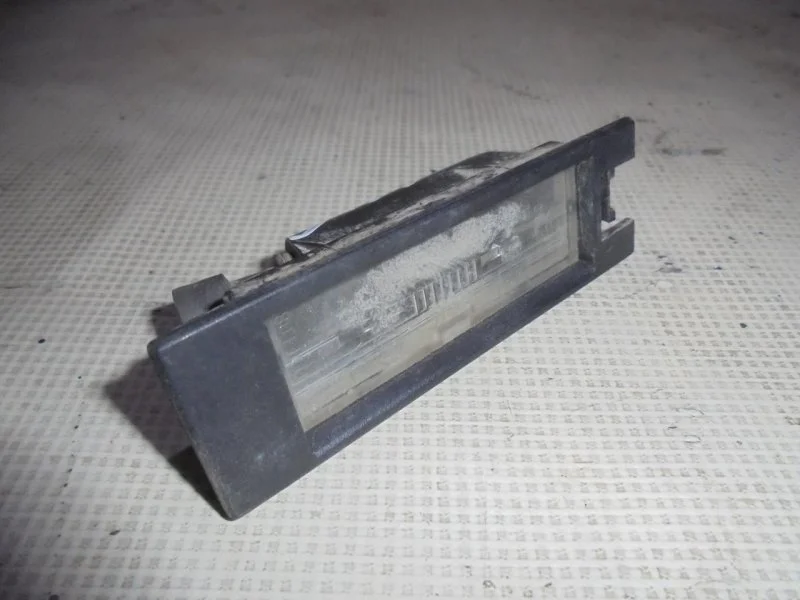 Фонарь подсветки номера Chevrolet Cobalt 13251936 T250