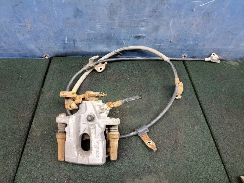 Суппорт тормозной Toyota Corolla 2010 4783012151 E150, задний правый