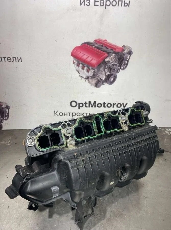 впускной коллектор Opel Astra  бензин 2009