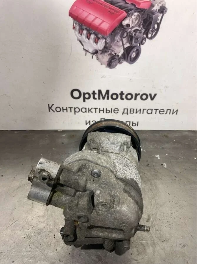 компрессор кондиционера Opel Astra  бензин 2009