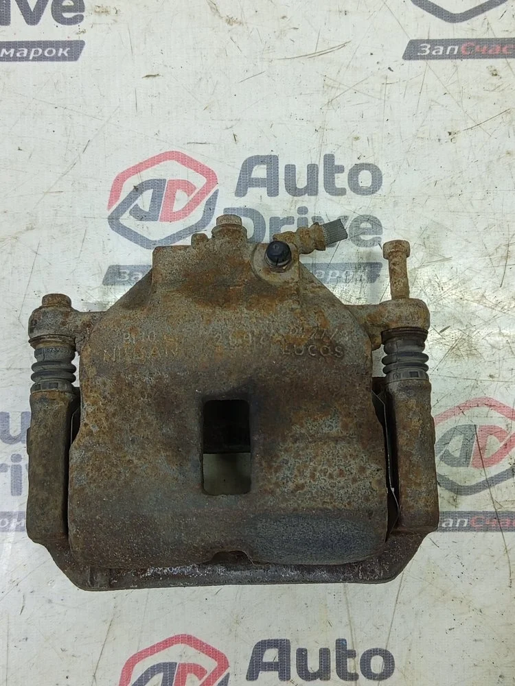Суппорт тормозной Nissan Almera 2005 N16