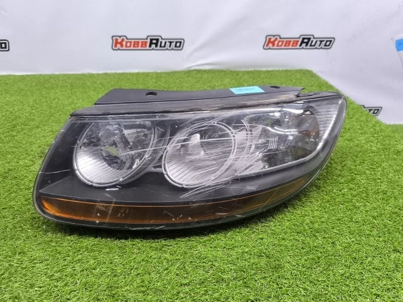 Фара галогеновая Hyundai Santa Fe 2005- 921012B025, левая