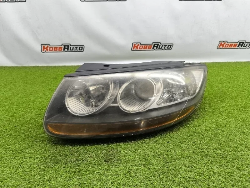 Фара галогеновая Hyundai Santa Fe 2008- 921012B025 2, левая