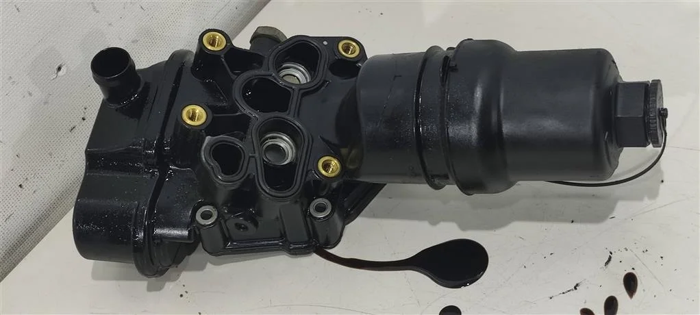 Корпус масляного фильтра 06F115397J  2.0 TFSI Vol