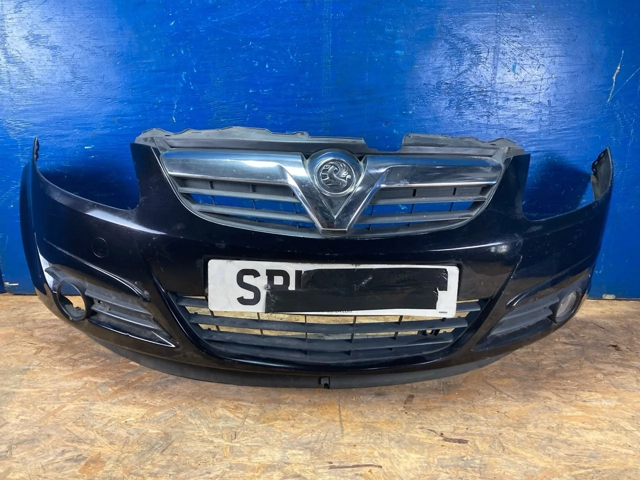 Бампер Opel Corsa D 2006-2011 13273522, передний