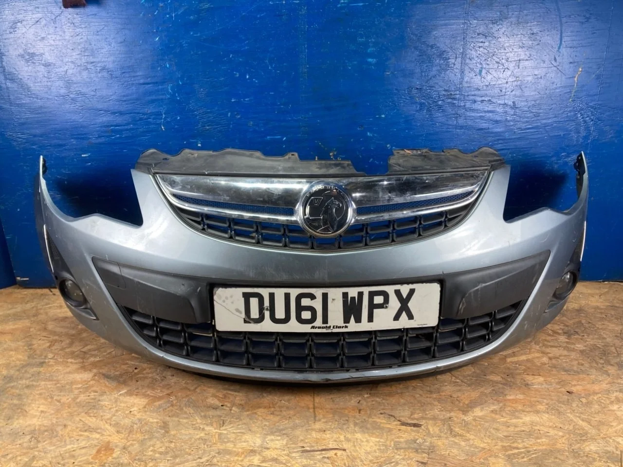 Бампер Opel Corsa D 2010-2014 13285996, передний