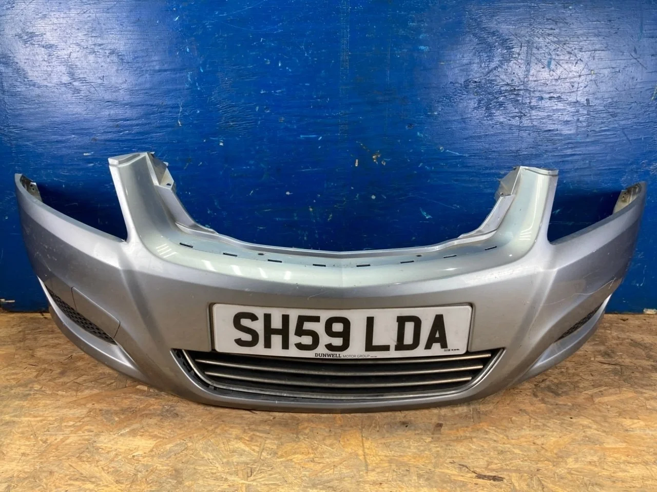 Бампер Opel Zafira B 2007-2015 13247273, передний
