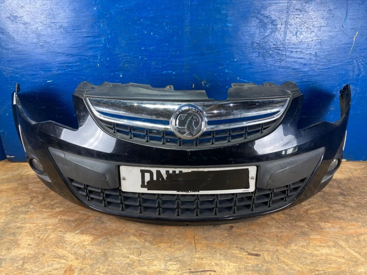 Бампер Opel Corsa D 2010-2014 13285996, передний