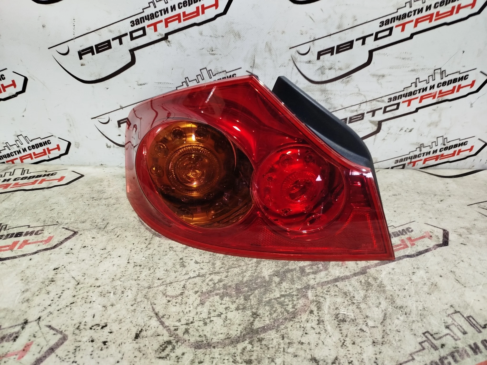 ФОНАРЬ NISSAN INFINITI G25 G35 G37 SKYLINE KV36 NV36 PV36 V36 D040 ЛЕВЫЙ 26555JK000 KA9909