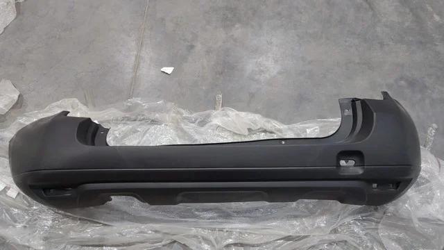 Бампер задний Уценка 30% (отломан кусок) RENAULT DUSTER HSA / HSM 2010-2015