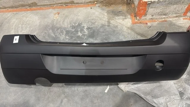 Бампер задний Уценка 40% (трещины,вмятины) RENAULT LOGAN I 2004-2009