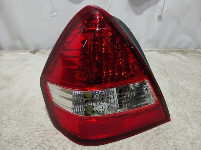 Фонарь задний левый Уценка 30% (трещина) NISSAN TIIDA C11 2007-2014