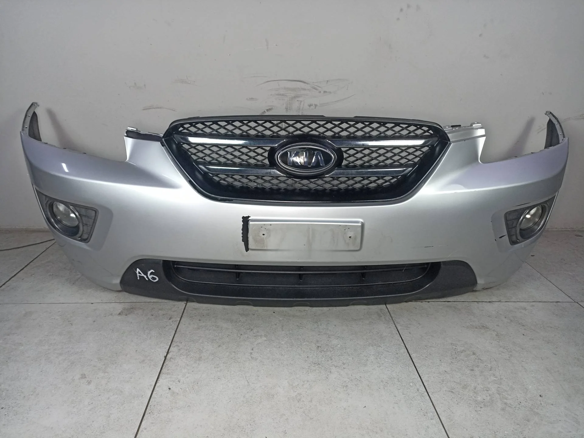 Бампер передний Kia Carens 2 2010 865111D050