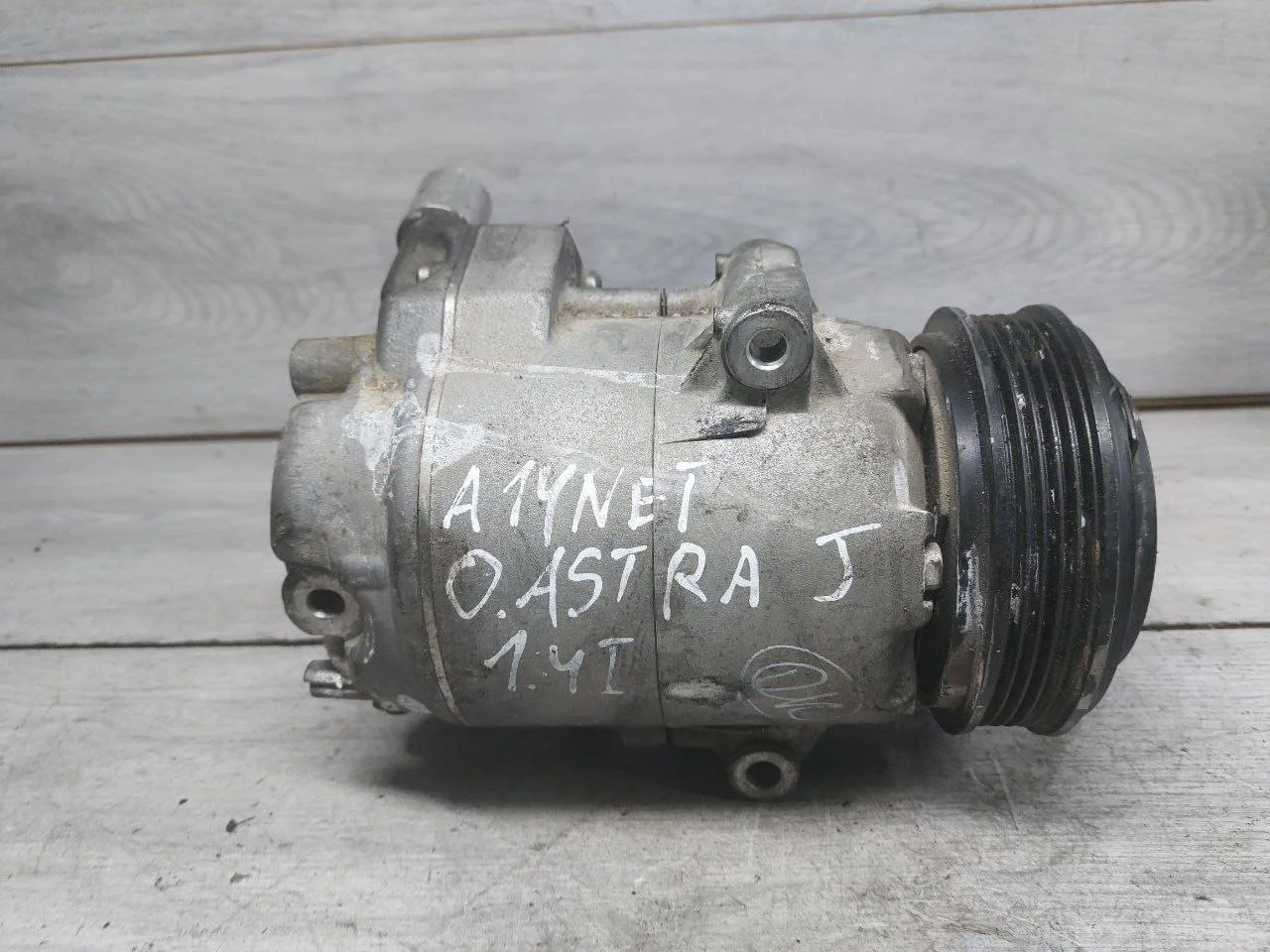 компрессор кондиционера Opel Astra J