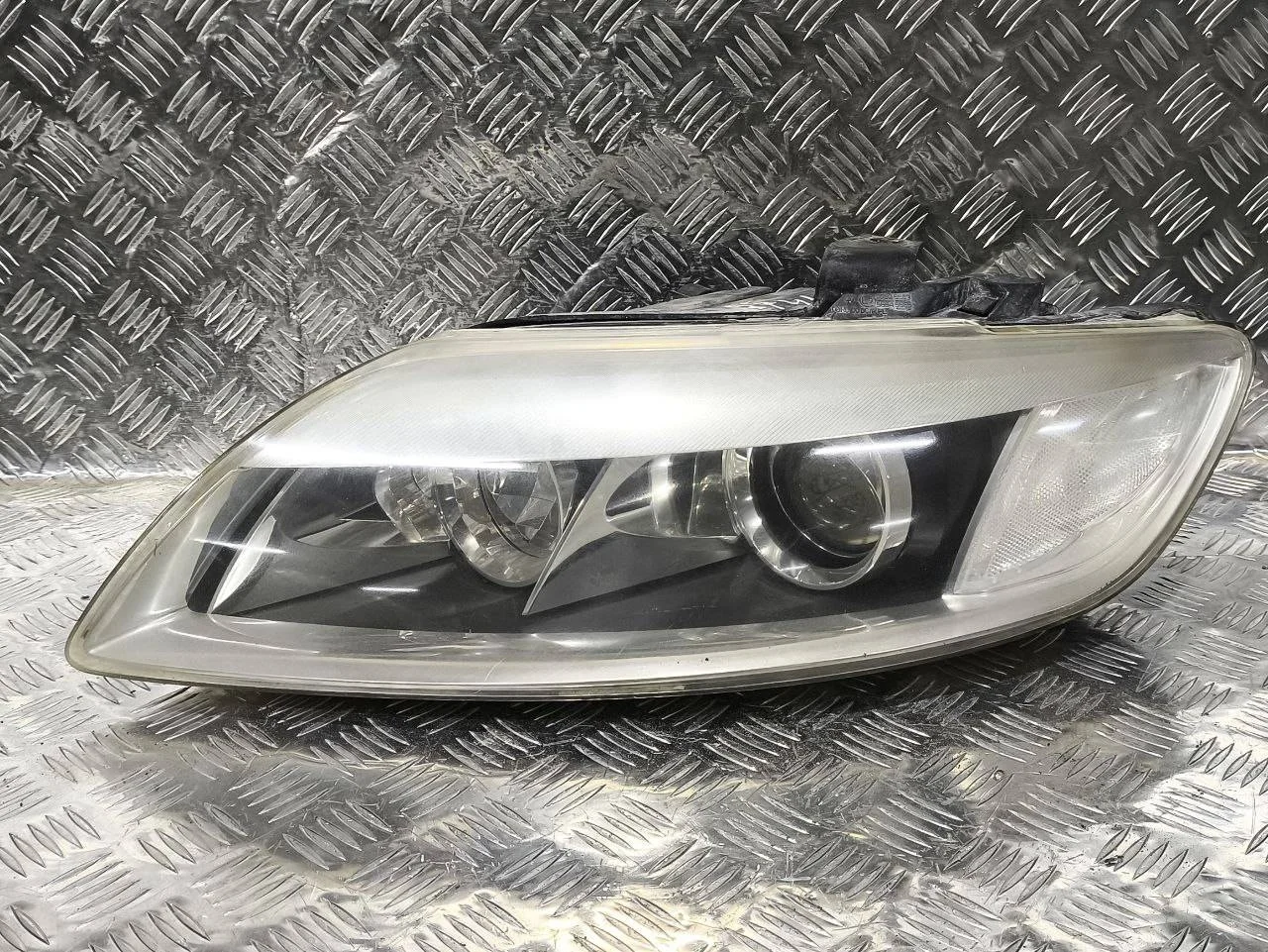 фара левая Audi Q7 4L