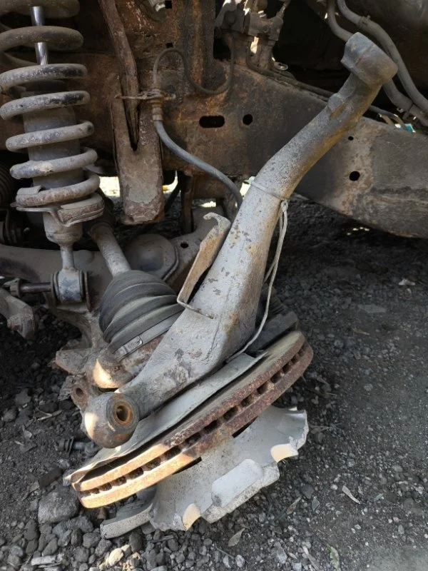 Кулак поворотный левый Nissan Pathfinder (R51M) 2004-2013 2005 Внедорожник