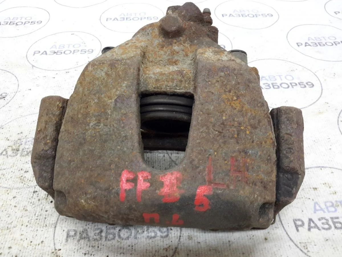 Суппорт передний левый Ford Focus II (2005—2008)