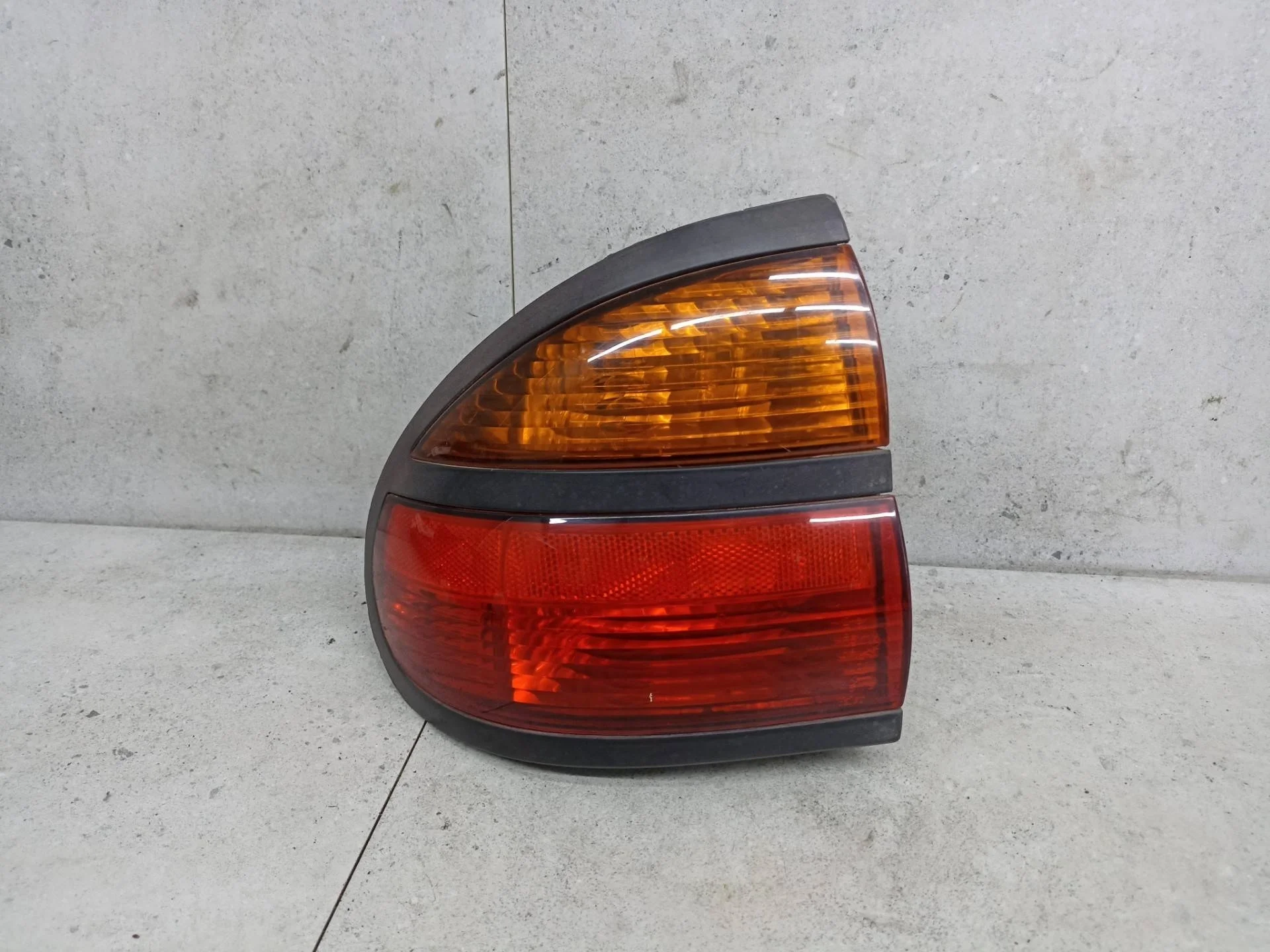 Фонарь задний левый Renault Laguna рест. 1999