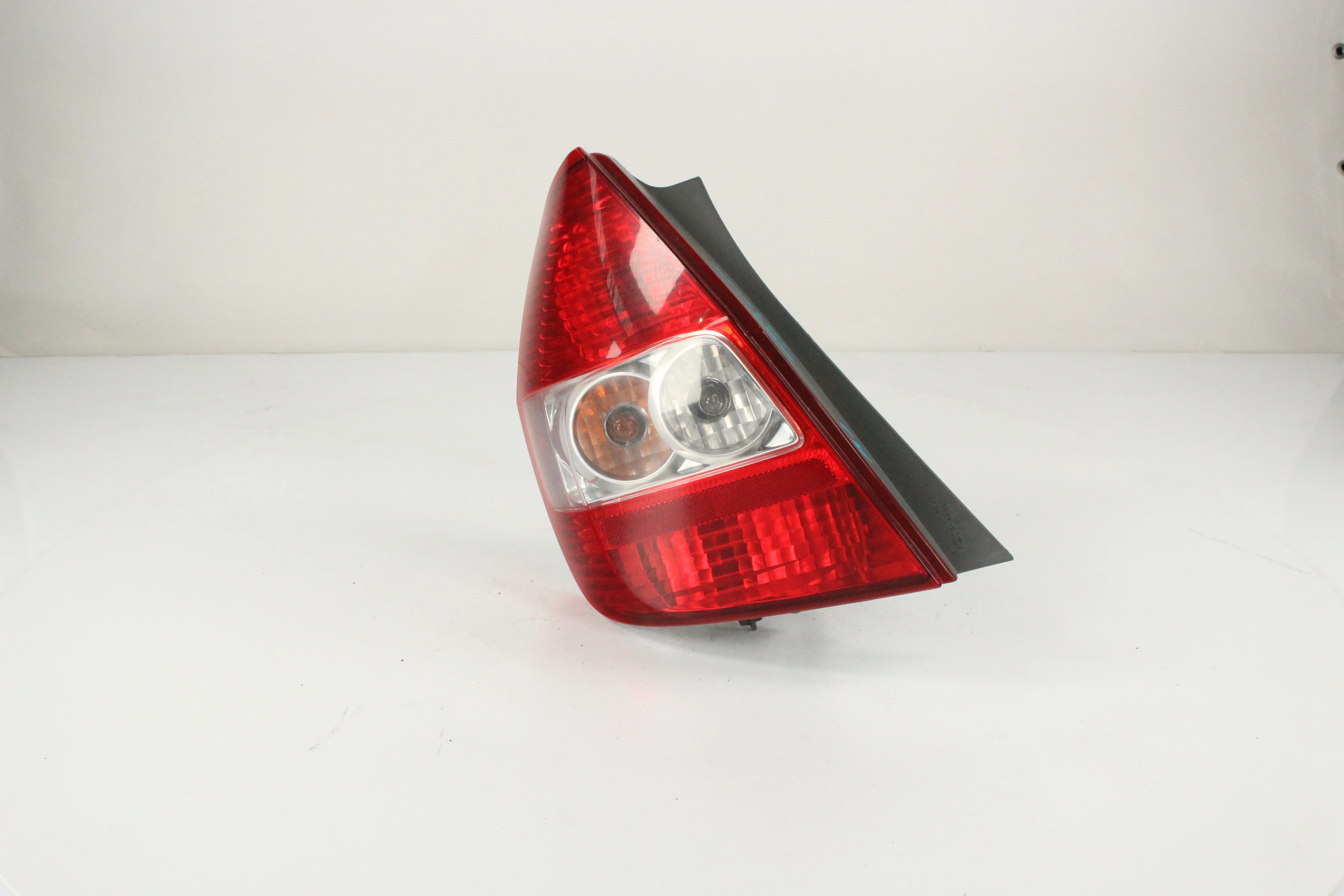 ФОНАРЬ HONDA FIT GD1 GD2 GD3 GD4 4949 БЕЛЫЙ 1 МОДЕЛЬ ЛЕВЫЙ 33551SAA003 TA1309