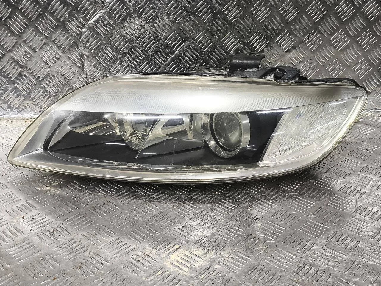 фара левая Audi Q7 4L