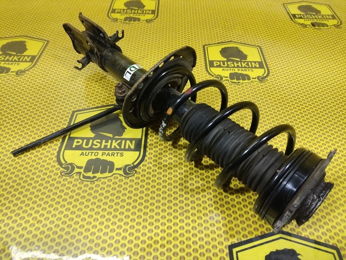Амортизатор подвески Nissan Juke 2014 F15
