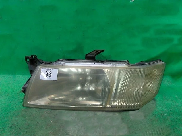 Фара левая (под полировку) N84W MITSUBISHI CHARIOT GRANDIS N8 / N9 1997-2003, SPACE WAGON N94W 1997-2004
