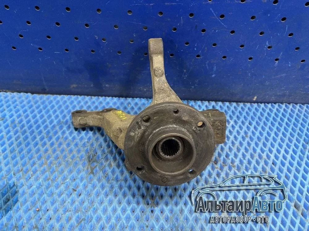 Кулак поворотный передний левый Nissan Note E11 (2005—2009) Nissan Note E11 (2005—2009) K12 левый руль 40015AX600