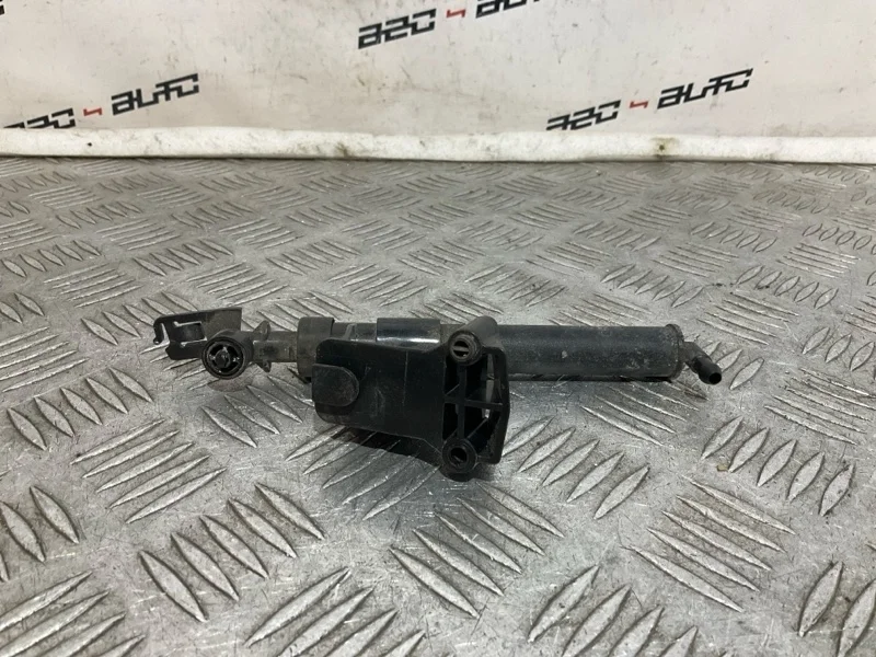 Форсунка омывателя Volvo V50 31294103, левая
