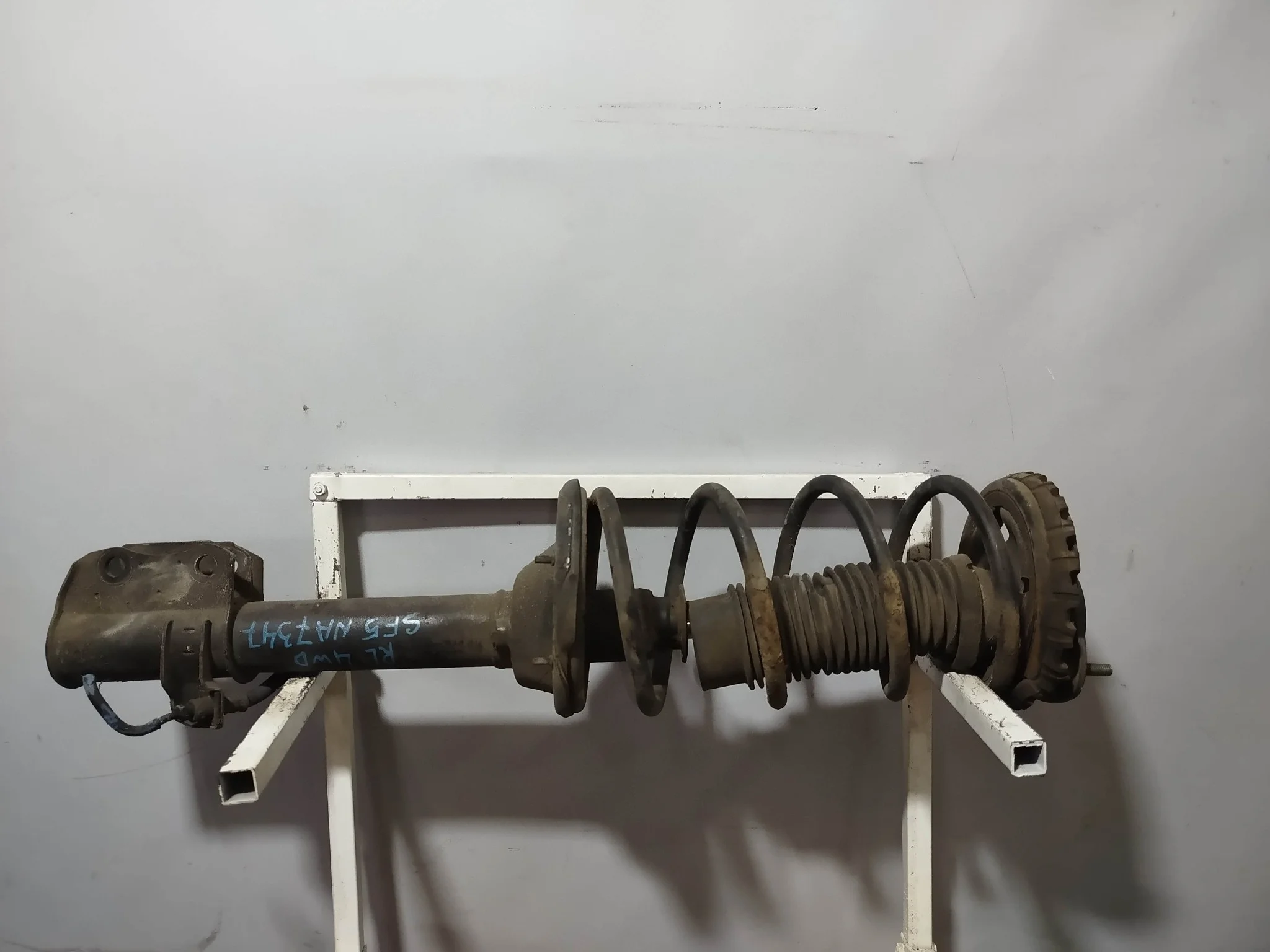 СТОЙКА ХОДОВКИ SUBARU FORESTER SF5 SF9 ЗАДНЯЯ ЛЕВАЯ 20360FC150 4WD NA7347