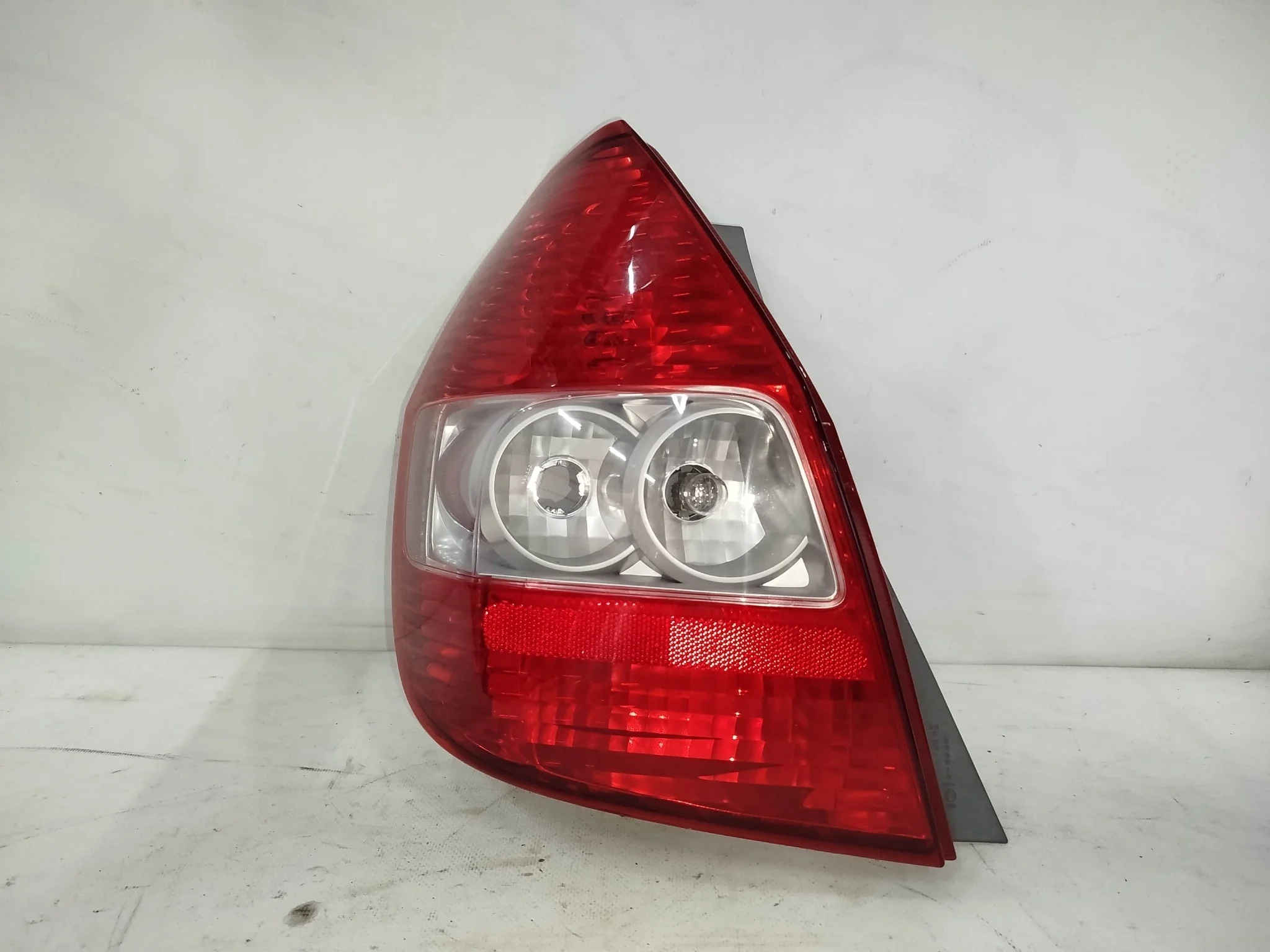 ФОНАРЬ HONDA FIT GD1 GD2 GD3 GD4 4949 БЕЛЫЙ 1 МОДЕЛЬ ЛЕВЫЙ 33551SAA003 NA7435
