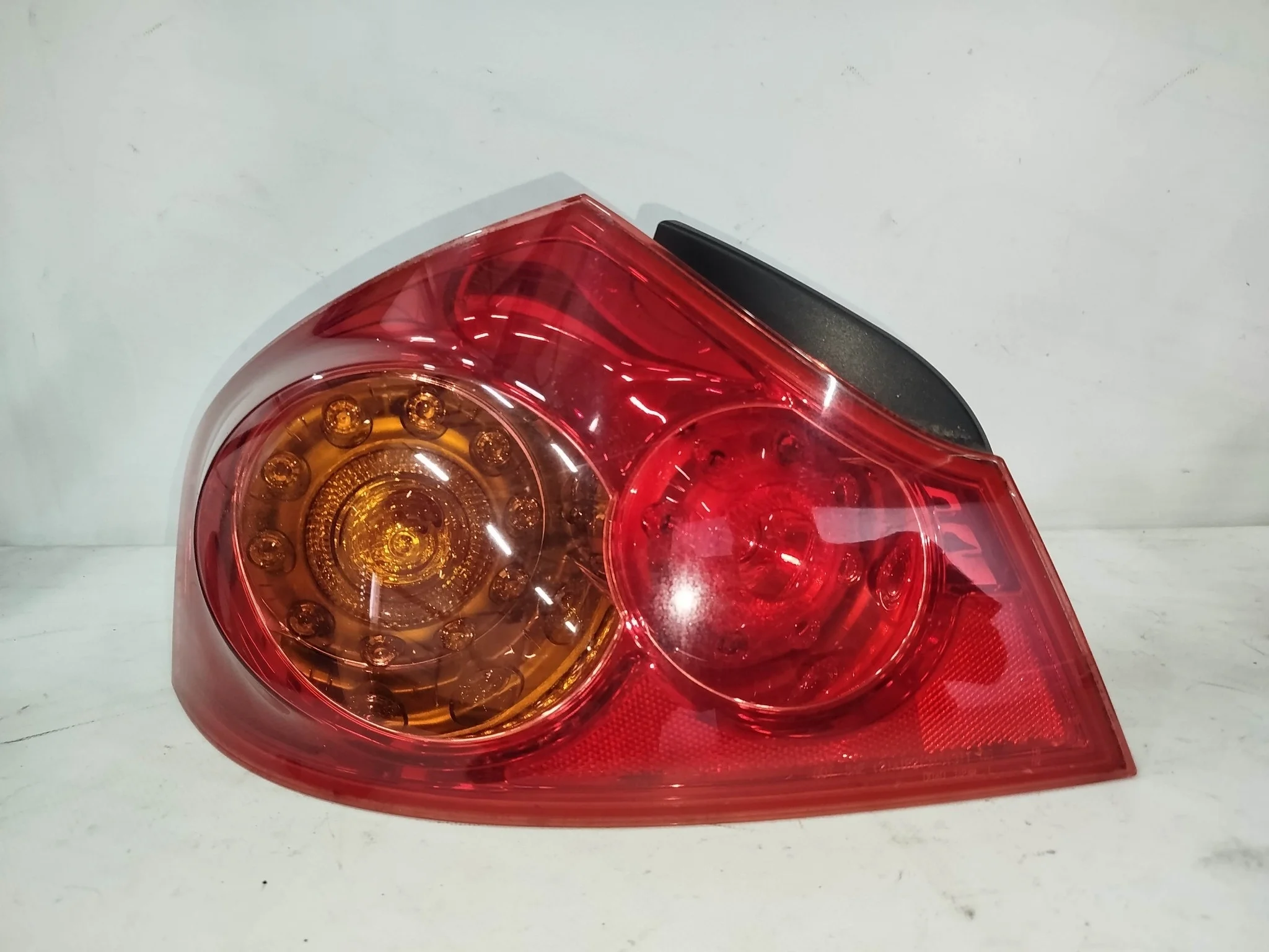 ФОНАРЬ NISSAN INFINITI G25 G35 G37 SKYLINE KV36 NV36 PV36 V36 D040 ЛЕВЫЙ 26555JK000 NA7339