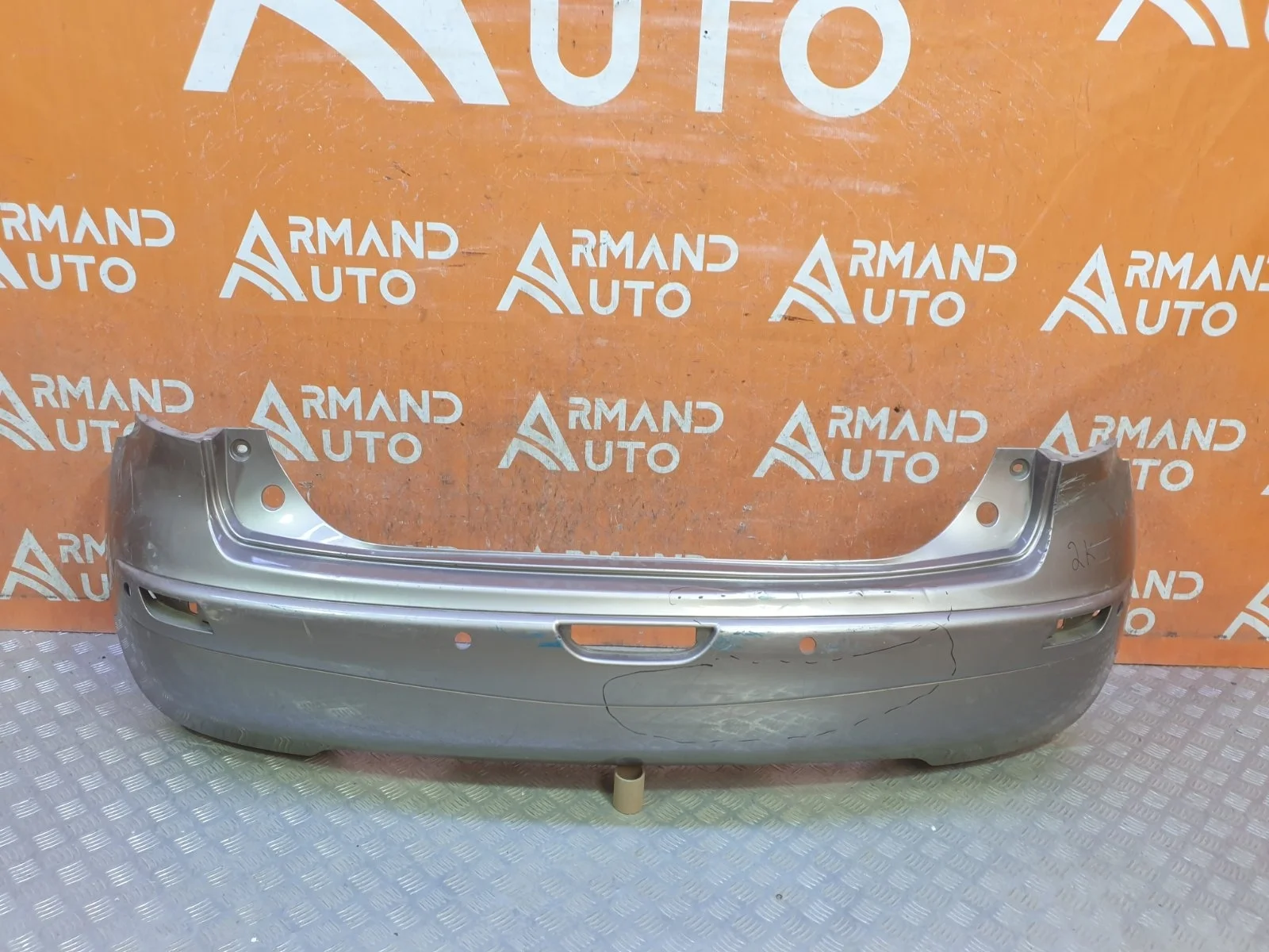 Бампер Nissan Note 2009-2013