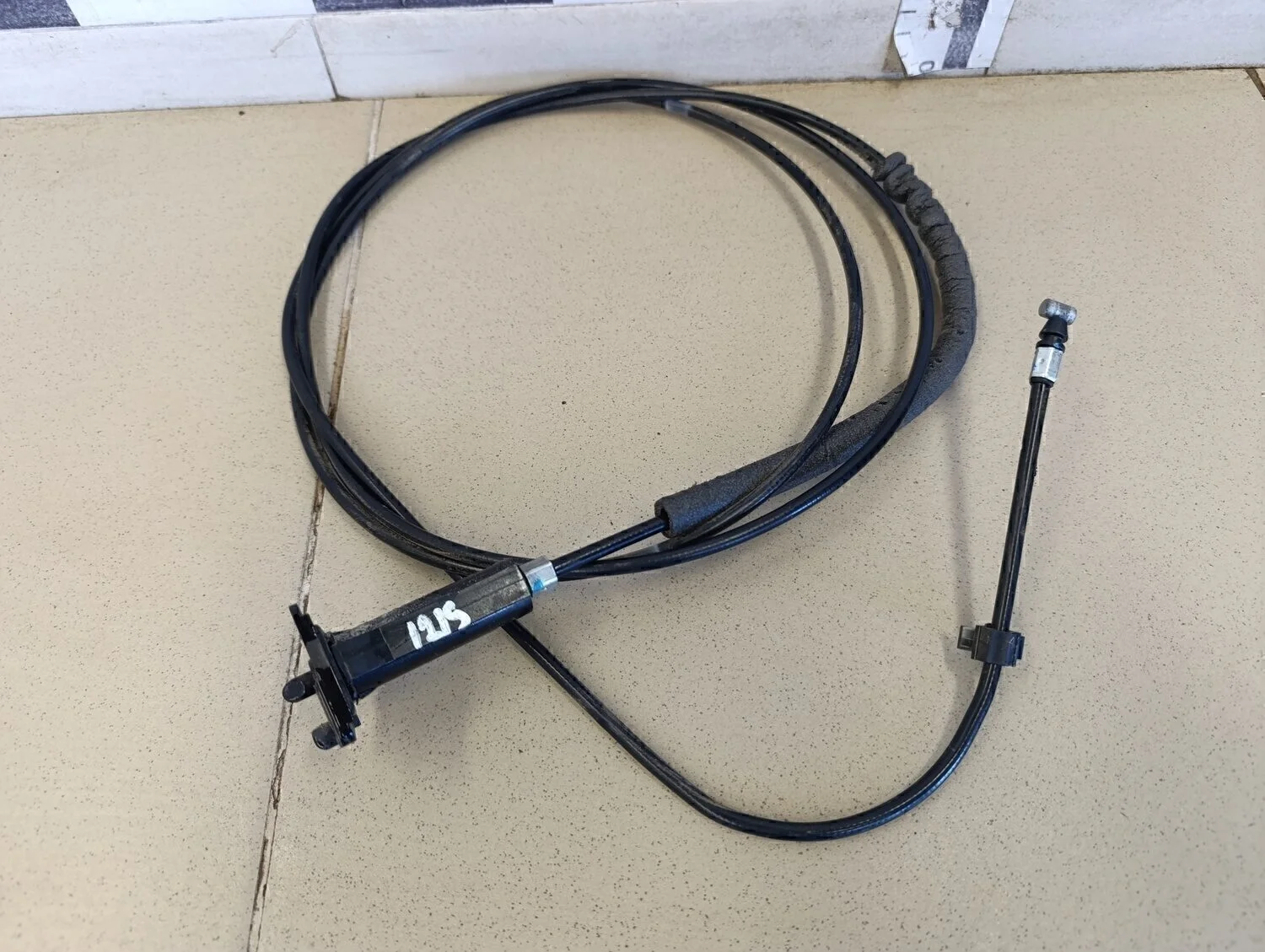 Трос лючка бензобака RIO 2011-2017