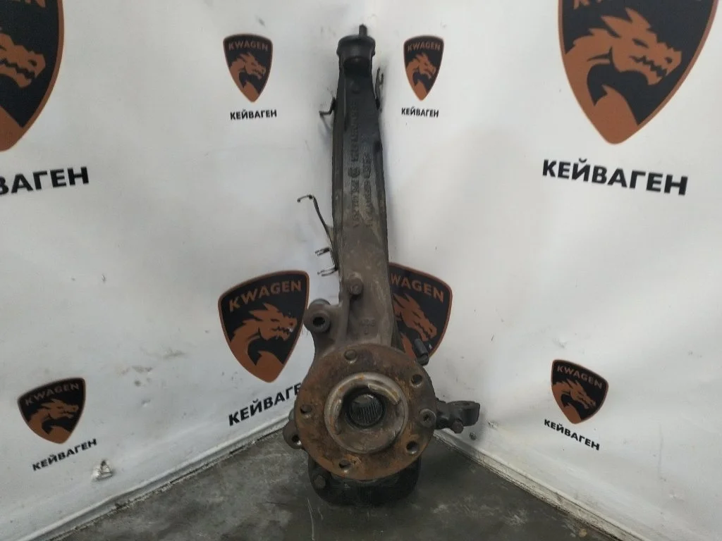 Кулак поворотный Volkswagen Touareg 2011 7P