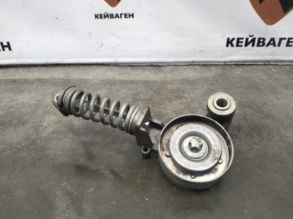 Ролик натяжной навесного оборудования Opel Astra J