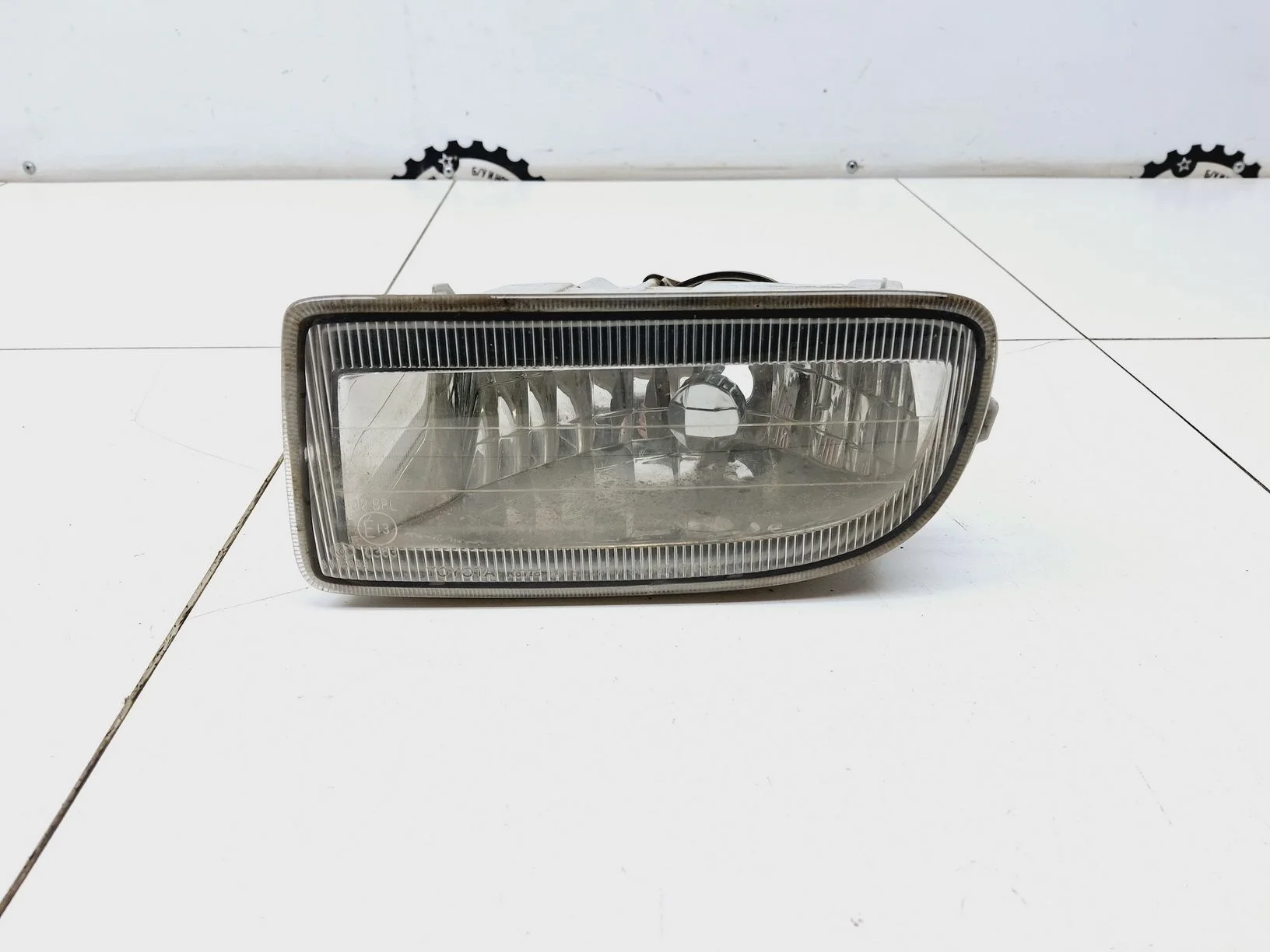 фара противотуманная Toyota Land Cruiser 100 1998-2007