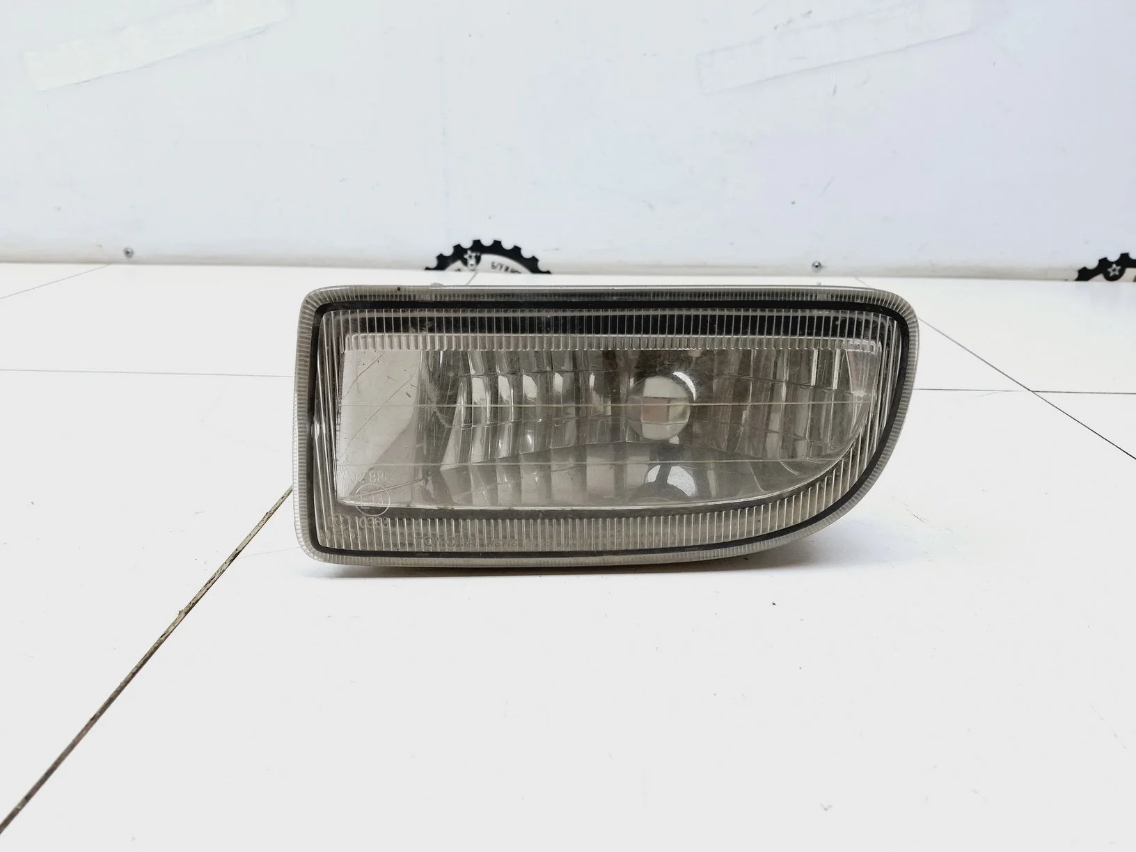 фара противотуманная Toyota Land Cruiser 100 1998-2007