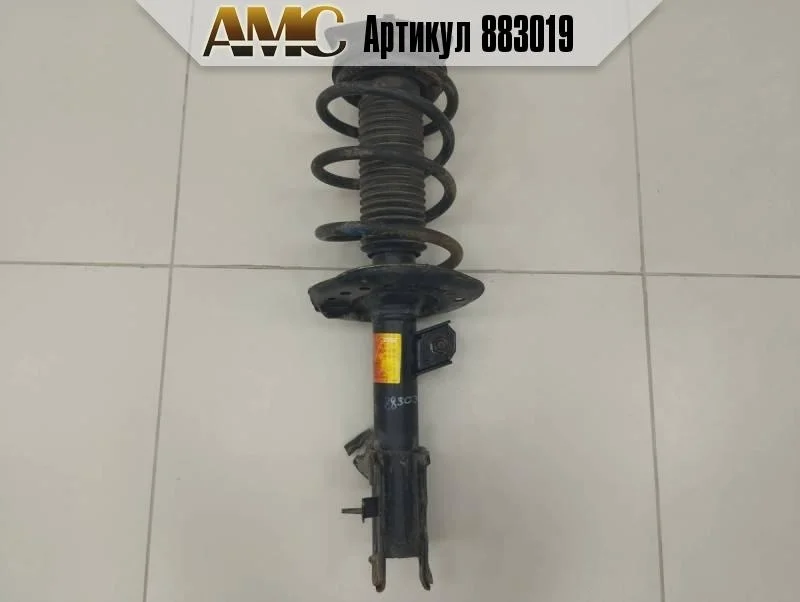 Амортизатор передний левый Nissan Qashqai J10 2006-2013