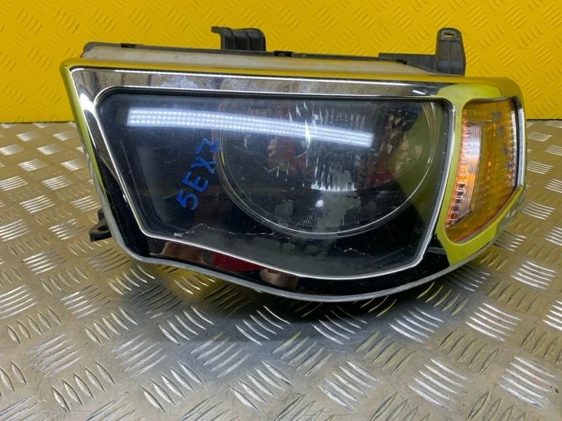 Фара левая Mitsubishi L200 (2006-2015) Пикап