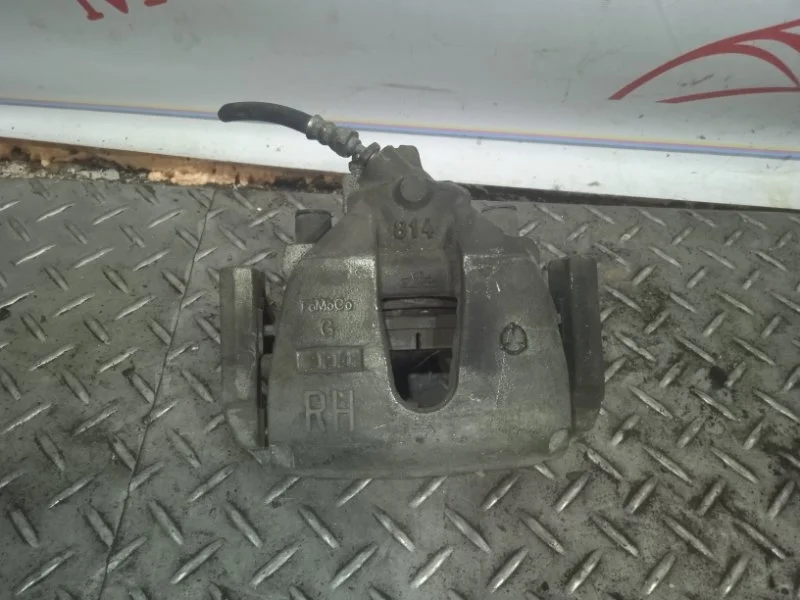 Суппорт тормозной Ford Kuga 1682875 1, передний правый