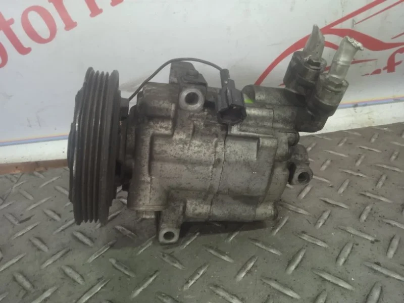 Компрессор кондиционера Nissan Note 92600AX80A E11
