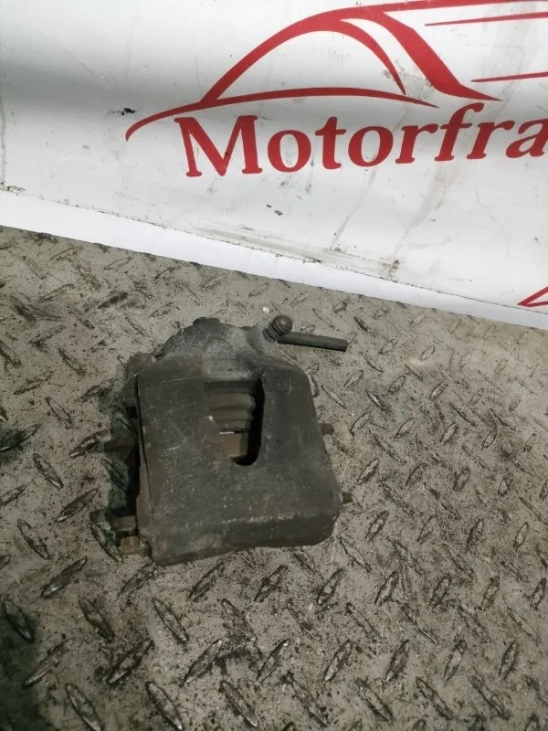 Суппорт тормозной Seat Ibiza 2008 1K0615123D 3, передний левый