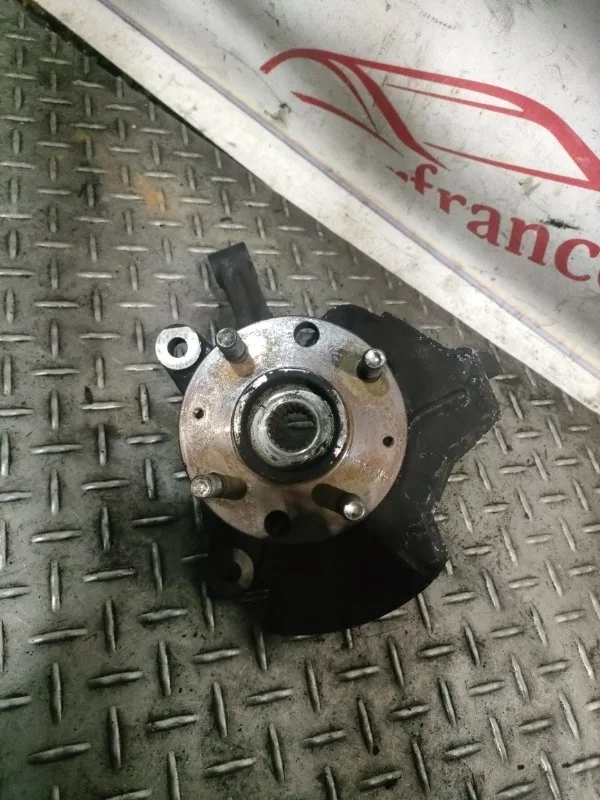 Кулак поворотный Chevrolet Aveo 2009 94524968 T250 1.2 16V B12D1, передний левый