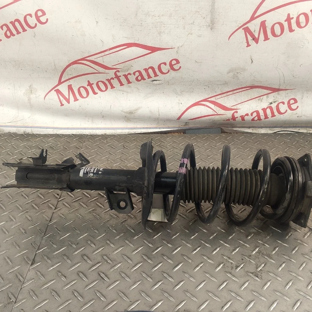 Стойка амортизатора Nissan Qashqai 2011 54303JD01A J10, передняя левая